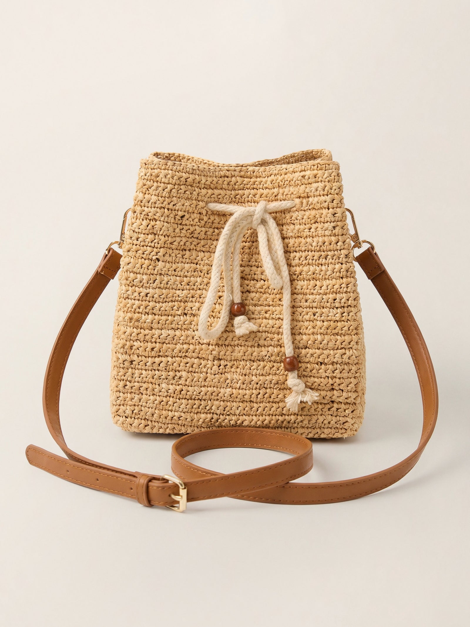 Mini Handwoven Raffia Drawstring Crossbody Bag